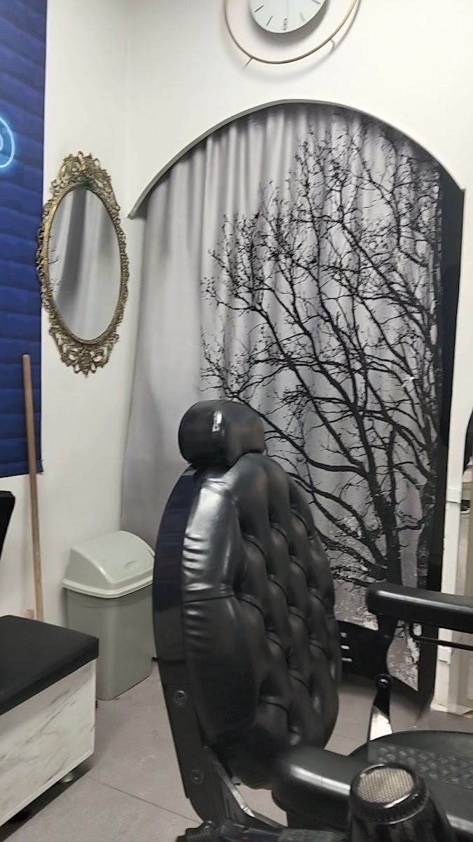 A single cutting station with its barber chair