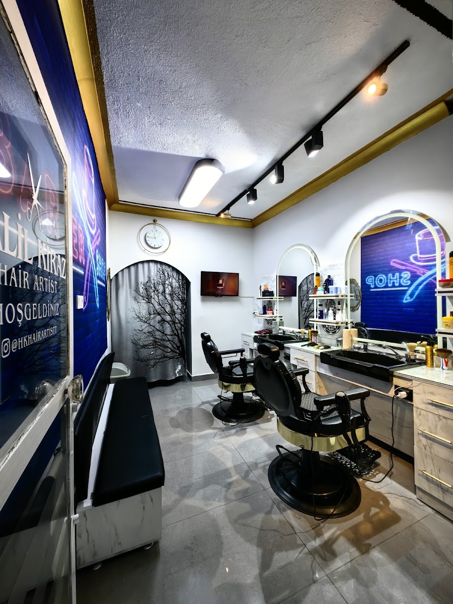 Inside the barbershop: cutting chairs and work stations